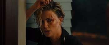 Movie still from “Fast X” (2023), directed by Justin Lin – A person brushing her hair; Close Up shot, Overhead angle
