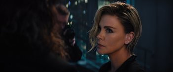 Movie still from “Fast X” (2023), directed by Justin Lin – A person with a camera; Close Up shot, Over the shoulder angle