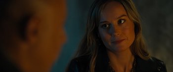 Movie still from “Fast X” (2023), directed by Justin Lin – A person with long hair; Close Up shot, Over the shoulder angle