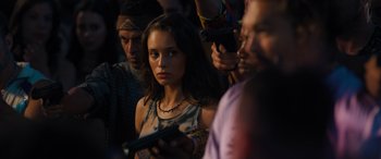 Movie still from “Fast X” (2023), directed by Justin Lin – A group of people standing next to each other; Close Up shot, Over the shoulder angle