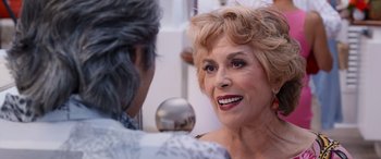Movie still from “Father of the Bride” (2022), directed by Gary Alazraki – An older woman talking to a younger woman; Close Up shot, Over the shoulder angle