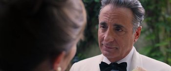 Movie still from “Father of the Bride” (2022), directed by Gary Alazraki – An older man in a tuxedo looking at a woman in a white dress; Close Up shot, Over the shoulder angle