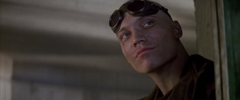 Movie still from “Alien³” (1992), directed by David Fincher – A person wearing goggles; Close Up shot, Low angle