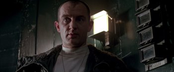 Movie still from “Alien³” (1992), directed by David Fincher – A person wearing a jacket; Close Up shot, Low angle