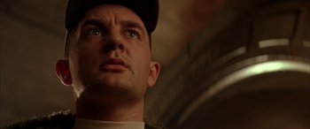 Movie still from “Alien³” (1992), directed by David Fincher – A person wearing a hat; Close Up shot, Low angle