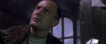 Movie still from “Alien³” (1992), directed by David Fincher – A person looking up at the sky; Close Up shot, Low angle