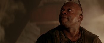 Movie still from “Alien³” (1992), directed by David Fincher – An older man looking up into the sky; Close Up shot, Low angle