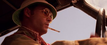 Movie still from “Fear and Loathing in Las Vegas” (1998), directed by Terry Gilliam – A man with a cigarette in his mouth; Close Up shot, Low angle