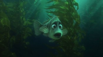 Movie still from “Finding Dory” (2016), directed by Angus MacLane – A fish is swimming in the water with a bunch of seaweed; Close Up shot, High angle