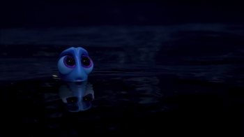 Movie still from “Finding Dory” (2016), directed by Angus MacLane – A blue toy head sitting in the middle of a body of water at night; Close Up shot, High angle