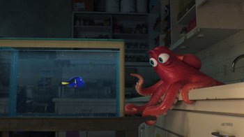 Movie still from “Finding Dory” (2016), directed by Angus MacLane – An octopus and a fish in a fish tank in a kitchen; Medium shot, Over the shoulder angle