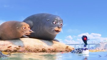 Movie still from “Finding Dory” (2016), directed by Angus MacLane – An animated scene of a seal and a dog; Medium shot, High angle