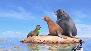 Movie still from “Finding Dory” (2016), directed by Angus MacLane – A group of sea lions sitting on top of a rock in the water; Wide shot, Low angle