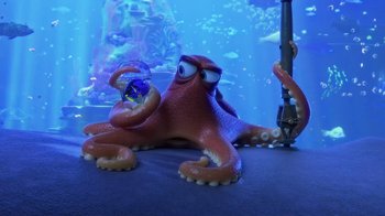 Movie still from “Finding Dory” (2016), directed by Angus MacLane – An image of an octopus in the water holding a glass of water; Medium shot, Over the shoulder angle