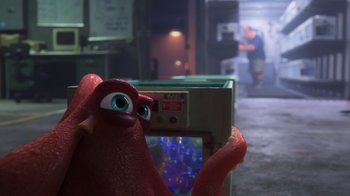 Movie still from “Finding Dory” (2016), directed by Angus MacLane – A red bird is standing in front of an oven; Medium shot, Over the shoulder angle