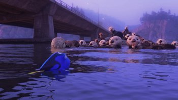 Movie still from “Finding Dory” (2016), directed by Angus MacLane – A group of animals in the water near a bridge; Wide shot, High angle
