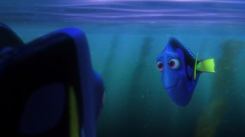 Movie still from “Finding Dory” (2016), directed by Angus MacLane – A blue fish is looking at a blue fish in the water; Medium shot, Over the shoulder angle