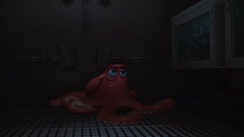 Movie still from “Finding Dory” (2016), directed by Angus MacLane – An octopus sitting on the floor in a room; Medium shot, High angle