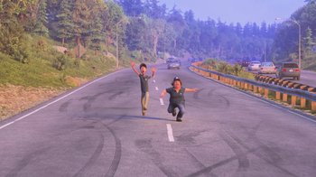 Movie still from “Finding Dory” (2016), directed by Angus MacLane – A couple of people that are running in the street; Wide shot, High angle