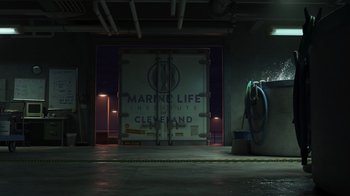 Movie still from “Finding Dory” (2016), directed by Angus MacLane – A garage door that has a sign on it; Extreme Wide shot, High angle