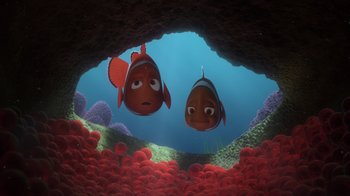 Movie still from “Finding Nemo” (2003), directed by Andrew Stanton – Two cartoon fish are swimming in the water; Wide shot, High angle