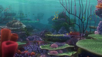 Movie still from “Finding Nemo” (2003), directed by Andrew Stanton – An underwater view of a coral reef with many different types of fish; Extreme Wide shot, High angle