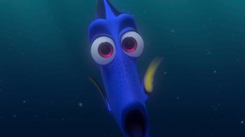 Movie still from “Finding Nemo” (2003), directed by Andrew Stanton – A blue fish with big googly eyes and a banana; Close Up shot, High angle