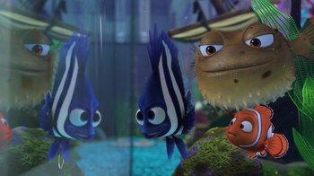 Movie still from “Finding Nemo” (2003), directed by Andrew Stanton – A fish in an aquarium; Medium shot, Over the shoulder angle