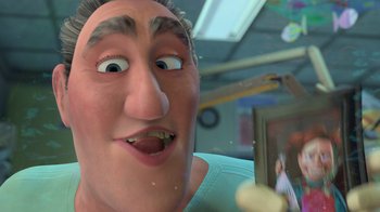 Movie still from “Finding Nemo” (2003), directed by Andrew Stanton – An animated man with a goofy look on his face; Close Up shot, Over the shoulder angle