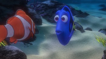 Movie still from “Finding Nemo” (2003), directed by Andrew Stanton – A blue fish and an orange fish in the sand; Medium shot, Over the shoulder angle