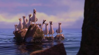 Movie still from “Finding Nemo” (2003), directed by Andrew Stanton – A group of seagulls standing on top of a rock in the ocean; Extreme Wide shot, High angle