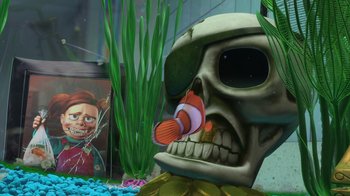 Movie still from “Finding Nemo” (2003), directed by Andrew Stanton – A skull with a clown fish in its mouth; Close Up shot, High angle