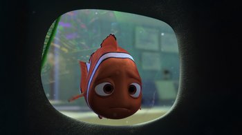 Movie still from “Finding Nemo” (2003), directed by Andrew Stanton – An orange and white fish is in the water; Medium shot, High angle