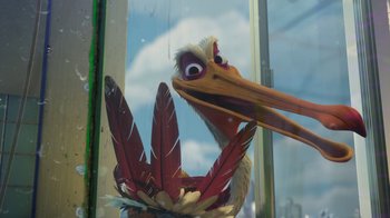 Movie still from “Finding Nemo” (2003), directed by Andrew Stanton – A bird with feathers in its beak; Close Up shot, Low angle