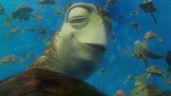 Movie still from “Finding Nemo” (2003), directed by Andrew Stanton – An image of a turtle swimming in the water; Close Up shot, Low angle