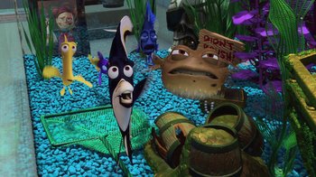Movie still from “Finding Nemo” (2003), directed by Andrew Stanton – A group of cartoon characters in a fish tank; Medium shot, High angle