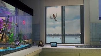 Movie still from “Finding Nemo” (2003), directed by Andrew Stanton – A room with a large window with a view of the ocean; Extreme Wide shot, High angle
