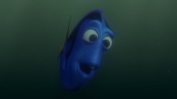 Movie still from “Finding Nemo” (2003), directed by Andrew Stanton – A blue fish is swimming in the water; Close Up shot, Over the shoulder angle