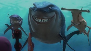 Movie still from “Finding Nemo” (2003), directed by Andrew Stanton – An image of an animated shark in the water; Medium shot, Low angle