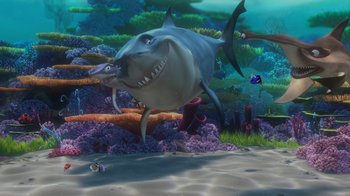Movie still from “Finding Nemo” (2003), directed by Andrew Stanton – An image of an animated shark in the ocean; Extreme Wide shot, High angle