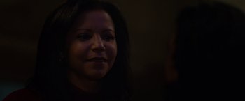 Movie still from “Firestarter” (2022), directed by Keith Thomas – A person with long hair; Close Up shot, Over the shoulder angle