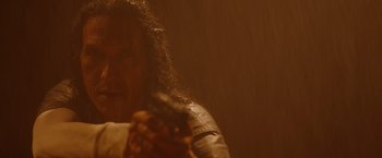 Movie still from “Firestarter” (2022), directed by Keith Thomas – A woman holding a gun in her hand; Close Up shot, Low angle