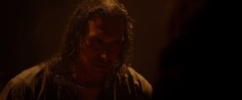 Movie still from “Firestarter” (2022), directed by Keith Thomas – A person with wet hair; Close Up shot, Over the shoulder angle