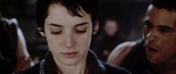 Movie still from “Alien: Resurrection” (1997), directed by Jean-Pierre Jeunet – A person with short hair; Close Up shot, Low angle