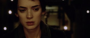 Movie still from “Alien: Resurrection” (1997), directed by Jean-Pierre Jeunet – A person with short brown hair; Close Up shot, High angle