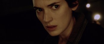 Movie still from “Alien: Resurrection” (1997), directed by Jean-Pierre Jeunet – A person with green eyes; Close Up shot, High angle