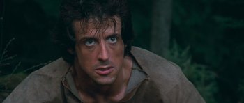 Movie still from “First Blood” (1982), directed by Ted Kotcheff – Sylvester stallone in rambo : first blood part ii; Close Up shot, Low angle