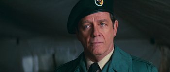 Movie still from “First Blood” (1982), directed by Ted Kotcheff – A person wearing a uniform; Close Up shot, Over the shoulder angle