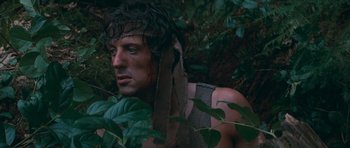 Movie still from “First Blood” (1982), directed by Ted Kotcheff – A person with a head covering; Close Up shot, High angle