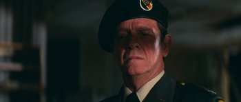 Movie still from “First Blood” (1982), directed by Ted Kotcheff – A person wearing a uniform; Close Up shot, Low angle